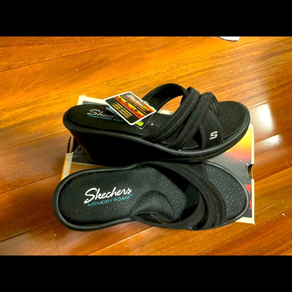 Women Skechers black sandals